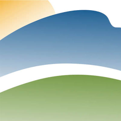 Abstract design with blue, white, and green curves.